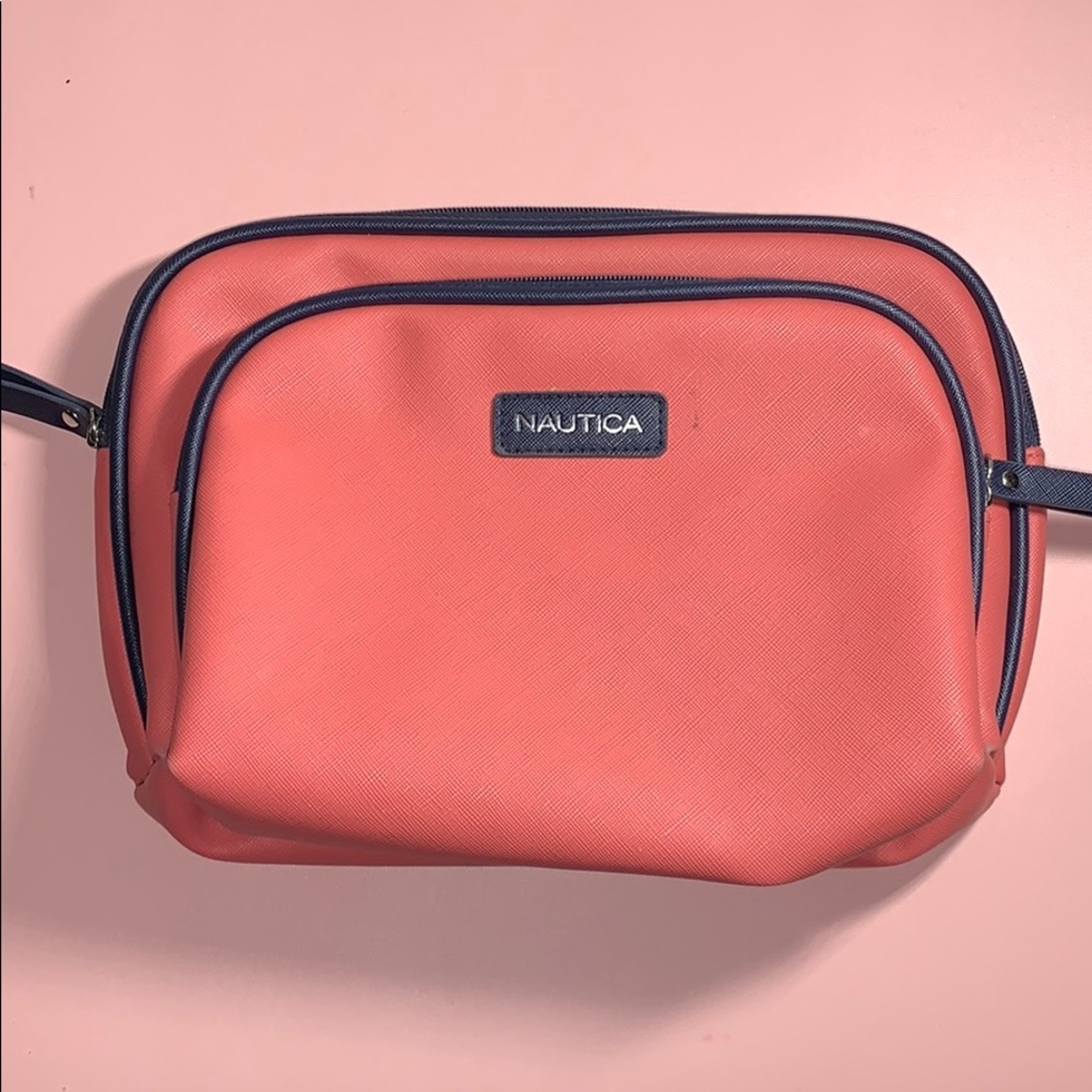 Two pink cosmetic or travel bags!